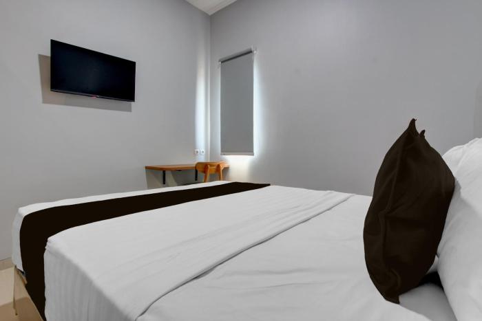 oyo 95180 enshe guest house syariah