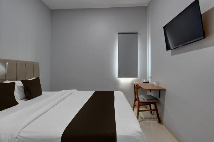 oyo 95180 enshe guest house syariah