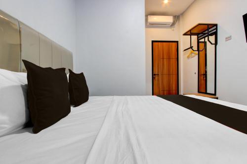 oyo 95180 enshe guest house syariah