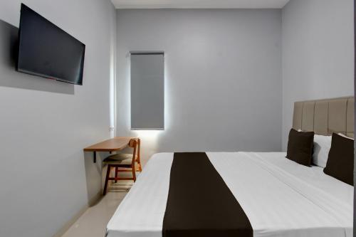 oyo 95180 enshe guest house syariah