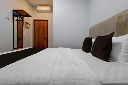 oyo 95180 enshe guest house syariah