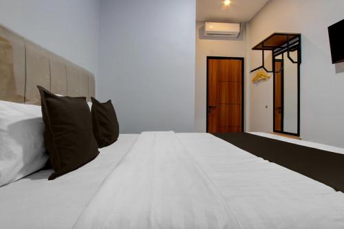 oyo 95180 enshe guest house syariah