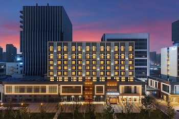 Mehood Lestie Hotel(Xi'an Xixian Wuyue Plaza Afanggong South Metro Station Store),,4 star
