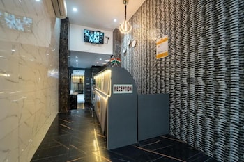 glitz rexton inn iit powai