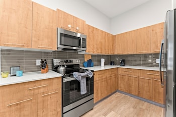 riviere apartments king bed suite and pool and gym and pet friendly and near epic universe