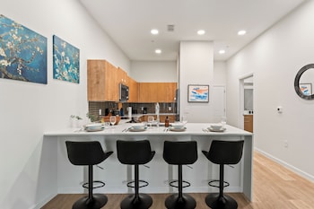 riviere apartments king bed suite and pool and gym and pet friendly and near epic universe