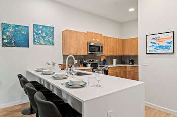 riviere apartments king bed suite and pool and gym and pet friendly and near epic universe