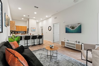 riviere apartments king bed suite and pool and gym and pet friendly and near epic universe