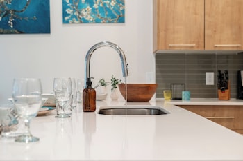 riviere apartments king bed suite and pool and gym and pet friendly and near epic universe