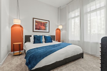 riviere apartments king bed suite and pool and gym and pet friendly and near epic universe