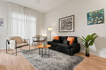 riviere apartments king bed suite and pool and gym and pet friendly and near epic universe