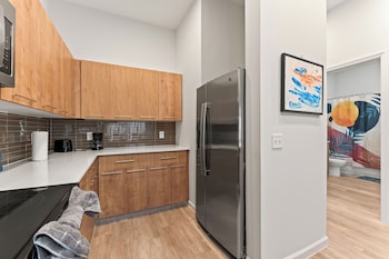 riviere apartments king bed suite and pool and gym and pet friendly and near epic universe