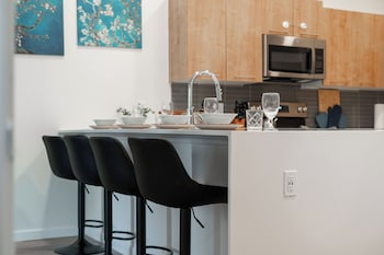 riviere apartments king bed suite and pool and gym and pet friendly and near epic universe