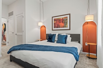 riviere apartments king bed suite and pool and gym and pet friendly and near epic universe
