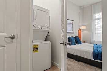 riviere apartments king bed suite and pool and gym and pet friendly and near epic universe