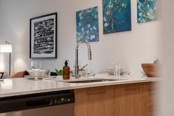 riviere apartments king bed suite and pool and gym and pet friendly and near epic universe