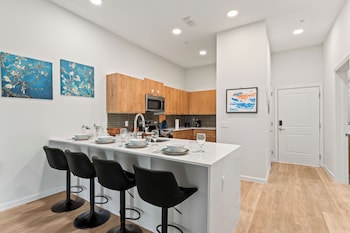 riviere apartments king bed suite and pool and gym and pet friendly and near epic universe