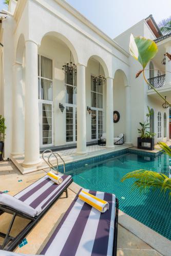 elivaas yashgeet 4 bhk villa with pool