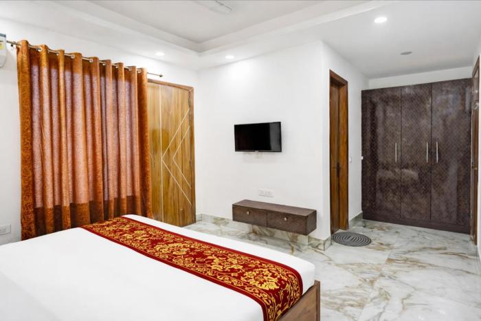 mauryan elite hotel ignou road