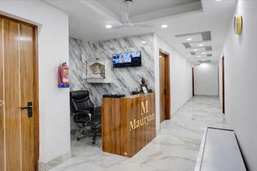 mauryan elite hotel ignou road