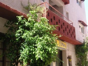 tina economy hotel