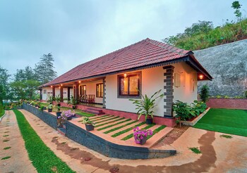 whispering hills attappadi by voye homes