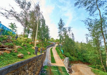 whispering hills attappadi by voye homes