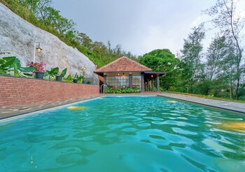 whispering hills attappadi by voye homes