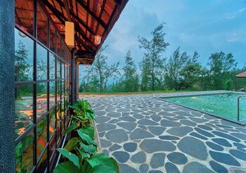 whispering hills attappadi by voye homes