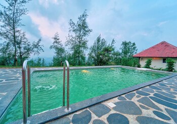 whispering hills attappadi by voye homes