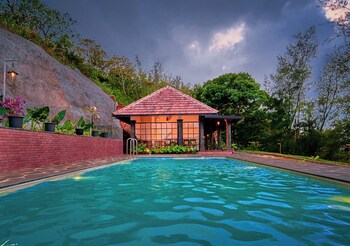whispering hills attappadi by voye homes