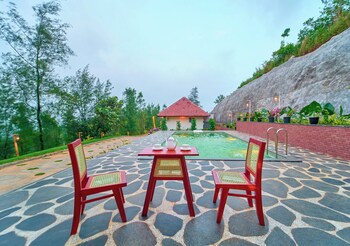 whispering hills attappadi by voye homes