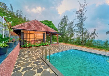 whispering hills attappadi by voye homes