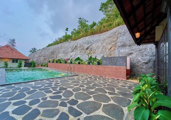 whispering hills attappadi by voye homes
