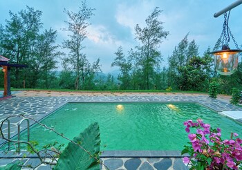 whispering hills attappadi by voye homes