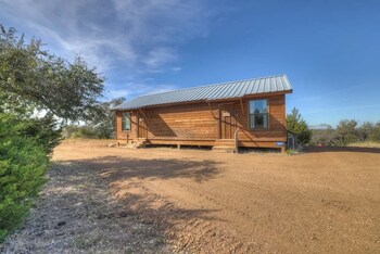 mesquite cabin with hot tub and hill country views