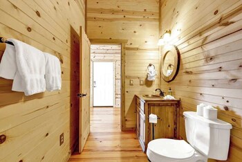 mesquite cabin with hot tub and hill country views