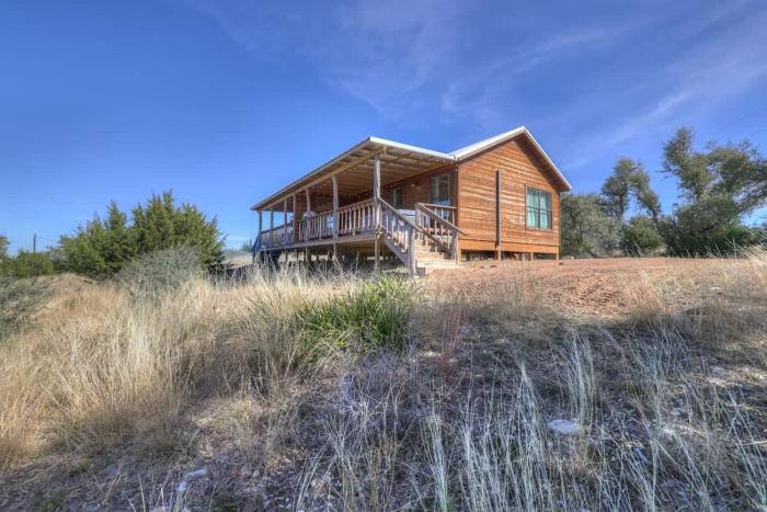 mesquite cabin with hot tub and hill country views