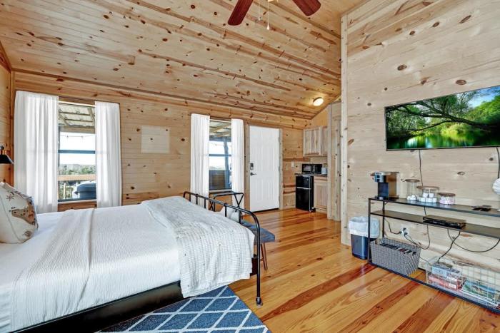 mesquite cabin with hot tub and hill country views