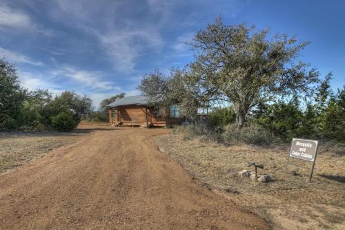 mesquite cabin with hot tub and hill country views