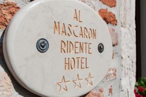 al mascaron ridente