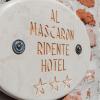 al mascaron ridente