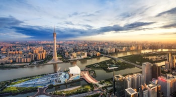 echarm plus international hotel zhujiang new town wuyangcun metro station free deliver service to canton fair complex during canton fair period