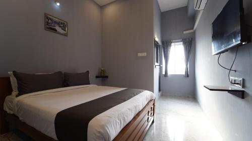 Hotel O Grey Luxury,93/1, Palakkad Main Road,  Kuniyamuthur, Coimbatore,3 star