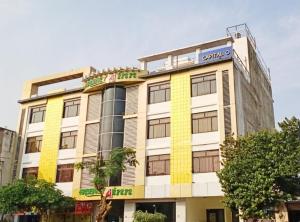 ardency inn by park tree udaipur