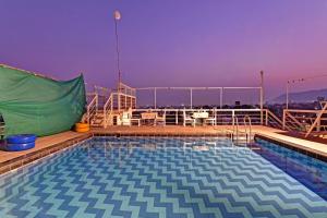 ardency inn by park tree udaipur