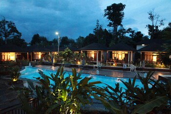 green tropical village hotel and resort