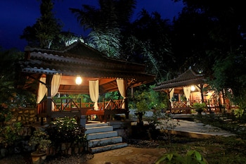 green tropical village hotel and resort