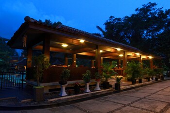 green tropical village hotel and resort