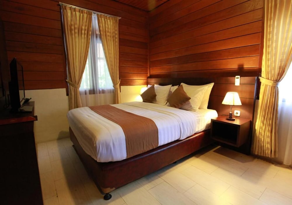 green tropical village hotel and resort